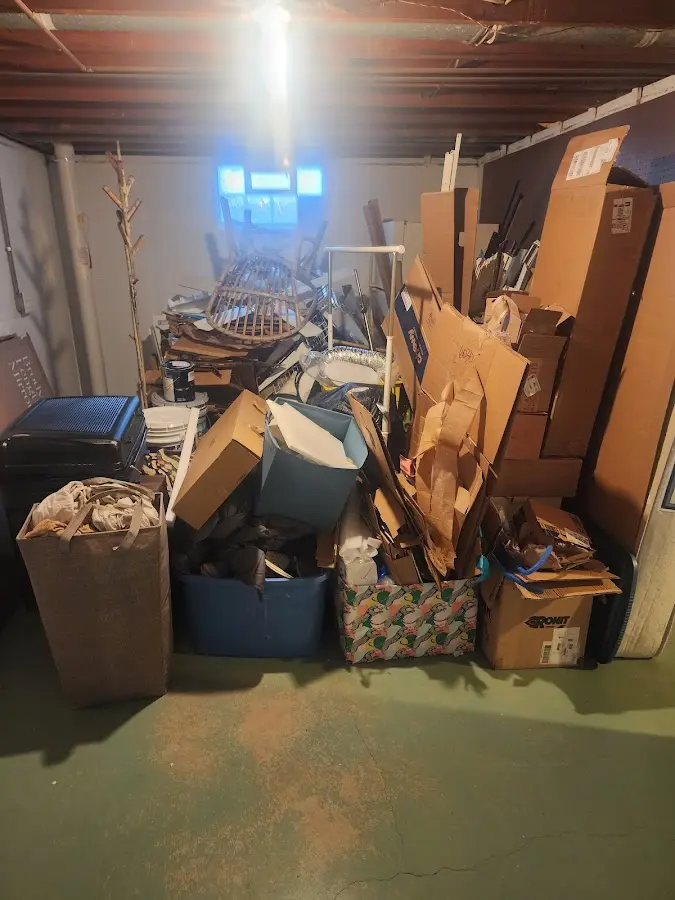 Roll-off dumpster container at job site for 6 Yard Dumpster Rental in Elm Grove